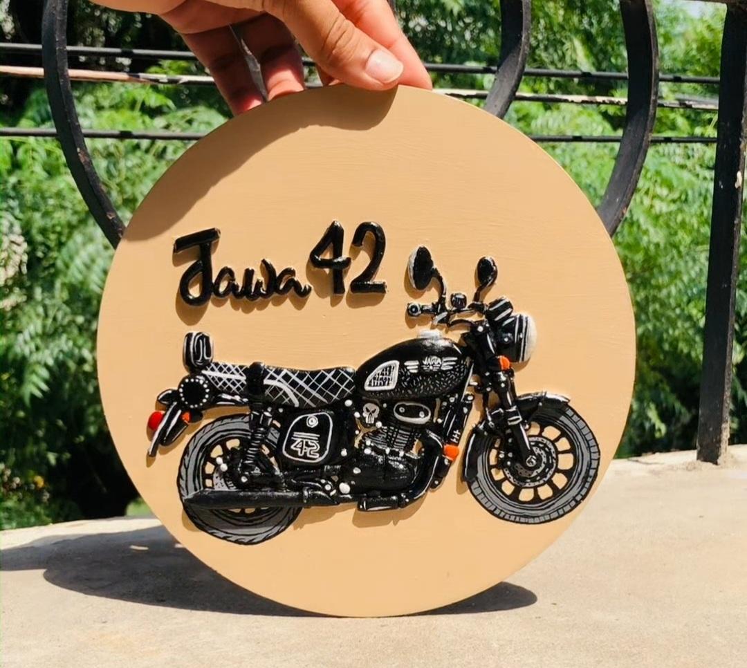 Custom Jawa 42 motorcycle Lippan artwork on a circular plaque