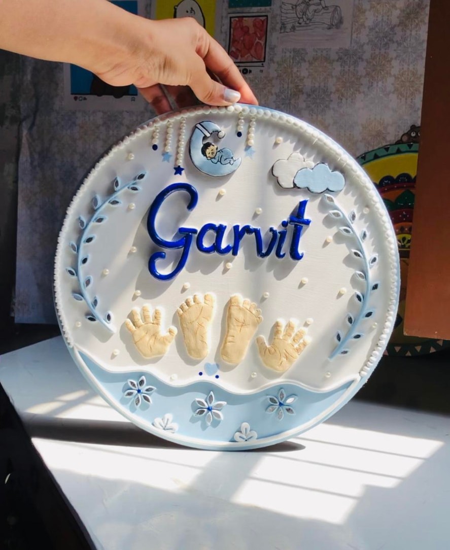 Personalized Garvit name Lippan artwork with hand impressions
