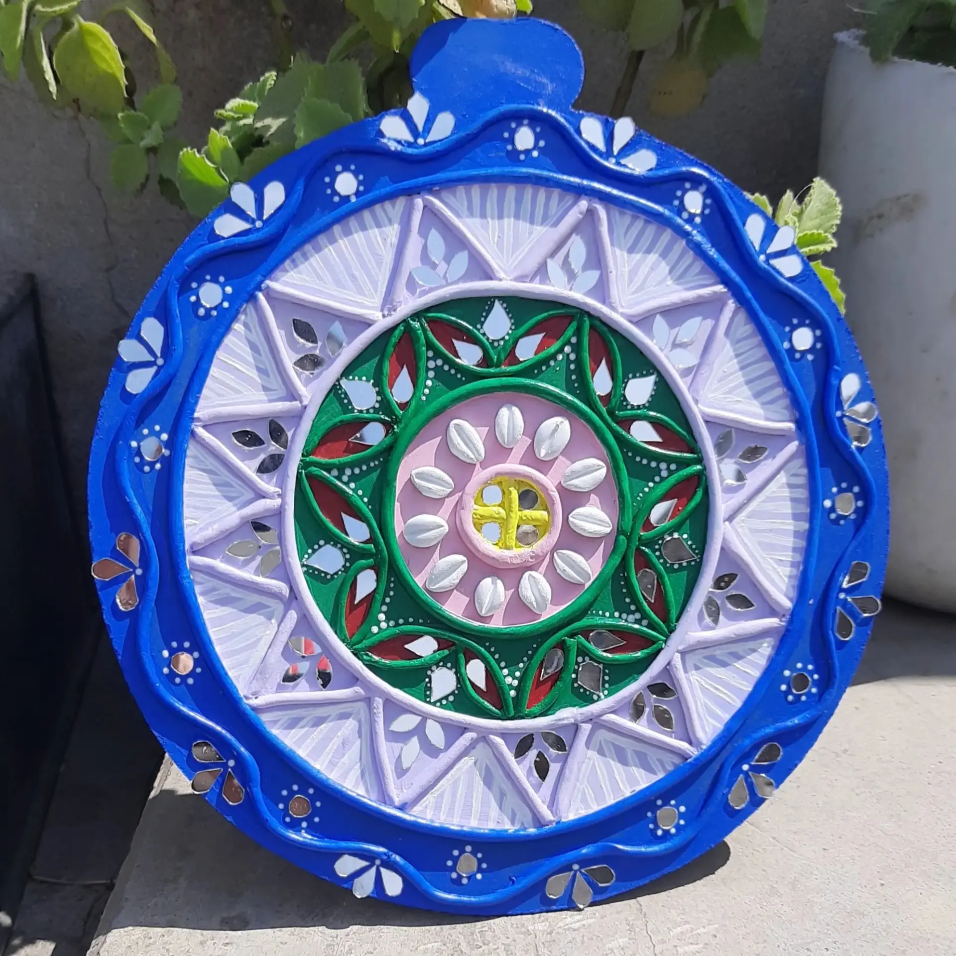 Handcrafted blue and green Lippan mandala artwork with mirror details